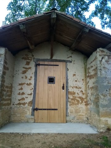 Fabrication d'une porte en chêne vers la Tour-du-Pin